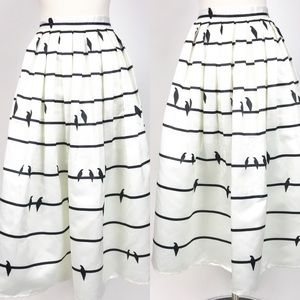 Chicwish Pleated bird skirt sing a love song xxl
